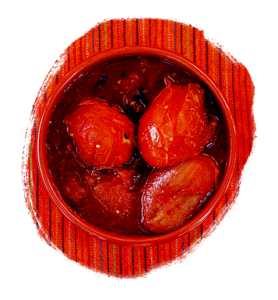 Fire-roasted tomatoes in a bowl on a red tablecloth